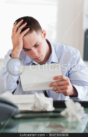 To use this stock image in your creative project, please select the size you need over to the right and click the "Add to Cart" button.
Your downloaded image will come with the Cutcaster watermark removed so don’t worry about the watermark you see on this page. Businessman reading a bill stock photo, Frustrated businessman reading a bill by Wavebreak Media
