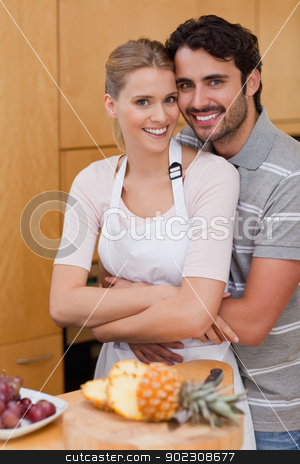 To use this stock image in your creative project, please select the size you need over to the right and click the "Add to Cart" button.
Your downloaded image will come with the Cutcaster watermark removed so don’t worry about the watermark you see on this page. Portrait of a posing with fruits stock photo, Portrait of a posing with fruits in their kitchen by Wavebreak Media
