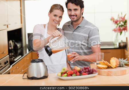 To use this stock image in your creative project, please select the size you need over to the right and click the "Add to Cart" button.
Your downloaded image will come with the Cutcaster watermark removed so don’t worry about the watermark you see on this page. Young couple making fruits juice stock photo, Young couple making fruits juice in their kitchen by Wavebreak Media