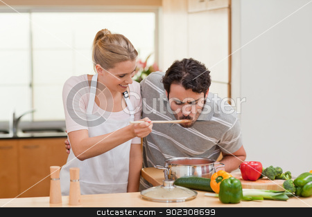 To use this stock image in your creative project, please select the size you need over to the right and click the "Add to Cart" button.
Your downloaded image will come with the Cutcaster watermark removed so don’t worry about the watermark you see on this page. Couple preparing a sauce stock photo, Couple preparing a sauce in their kitchen by Wavebreak Media