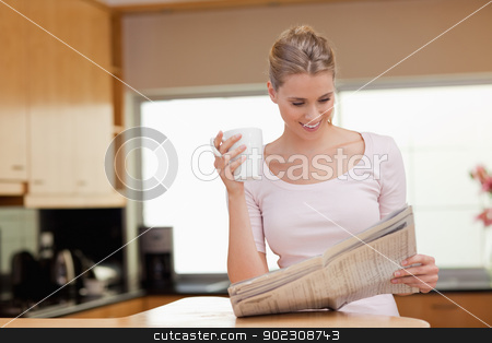 To use this stock image in your creative project, please select the size you need over to the right and click the "Add to Cart" button.
Your downloaded image will come with the Cutcaster watermark removed so don’t worry about the watermark you see on this page. Woman reading the news while having tea stock photo, Woman reading the news while having tea in her kitchen by Wavebreak Media