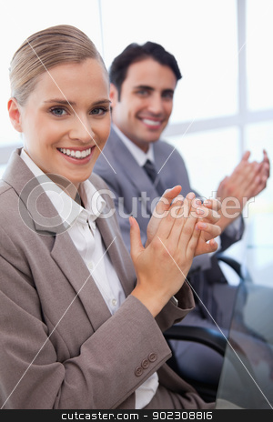 To use this stock image in your creative project, please select the size you need over to the right and click the "Add to Cart" button.
Your downloaded image will come with the Cutcaster watermark removed so don’t worry about the watermark you see on this page. Portrait of a smiling business team applauding stock photo, Portrait of a smiling business team applauding in a meeting room by Wavebreak Media