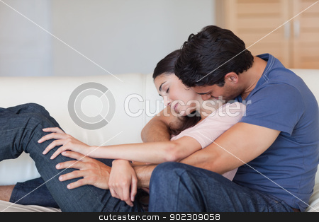 To use this stock image in your creative project, please select the size you need over to the right and click the "Add to Cart" button.
Your downloaded image will come with the Cutcaster watermark removed so don’t worry about the watermark you see on this page. Man kissing his wife in the neck stock photo, Man kissing his wife in the neck in their living room by Wavebreak Media