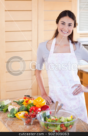 To use this stock image in your creative project, please select the size you need over to the right and click the "Add to Cart" button.
Your downloaded image will come with the Cutcaster watermark removed so don’t worry about the watermark you see on this page. Portrait of a woman standing up stock photo, Portrait of a woman standing up in her kitchen by Wavebreak Media