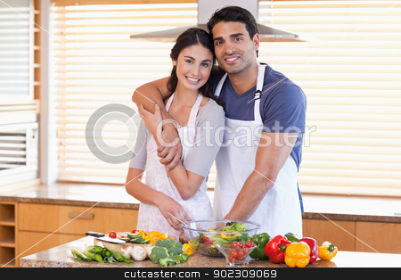 To use this stock image in your creative project, please select the size you need over to the right and click the "Add to Cart" button.
Your downloaded image will come with the Cutcaster watermark removed so don’t worry about the watermark you see on this page. Charming young couple posing stock photo, Charming young couple posing in their kitchen by Wavebreak Media