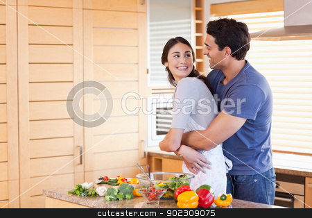 To use this stock image in your creative project, please select the size you need over to the right and click the "Add to Cart" button.
Your downloaded image will come with the Cutcaster watermark removed so don’t worry about the watermark you see on this page. Lovely couple embracing each other stock photo, Lovely couple embracing each other in their kitchen by Wavebreak Media