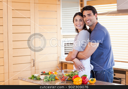 To use this stock image in your creative project, please select the size you need over to the right and click the "Add to Cart" button.
Your downloaded image will come with the Cutcaster watermark removed so don’t worry about the watermark you see on this page. Charming couple embracing each other stock photo, Charming couple embracing each other in their kitchen by Wavebreak Media