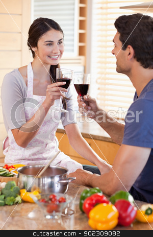 To use this stock image in your creative project, please select the size you need over to the right and click the "Add to Cart" button.
Your downloaded image will come with the Cutcaster watermark removed so don’t worry about the watermark you see on this page. Portrait of a couple having a glass of wine while cooking stock photo, Portrait of a couple having a glass of wine while cooking in their kitchen by Wavebreak Media