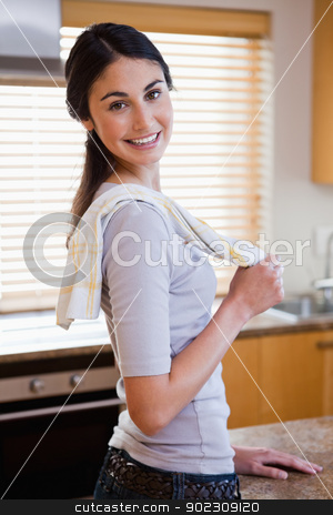 To use this stock image in your creative project, please select the size you need over to the right and click the "Add to Cart" button.
Your downloaded image will come with the Cutcaster watermark removed so don’t worry about the watermark you see on this page. Portrait of a housewife posing stock photo, Portrait of a housewife posing in her kitchen by Wavebreak Media