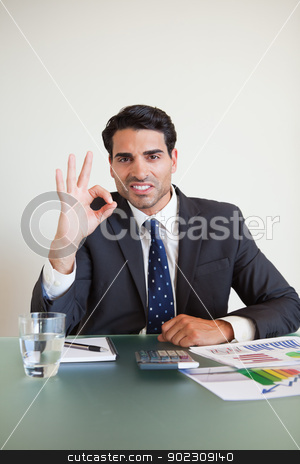 To use this stock image in your creative project, please select the size you need over to the right and click the "Add to Cart" button.
Your downloaded image will come with the Cutcaster watermark removed so don’t worry about the watermark you see on this page. Portrait of a businessman signing everything is perfect stock photo, Portrait of a businessman signing everything is perfect in his office by Wavebreak Media