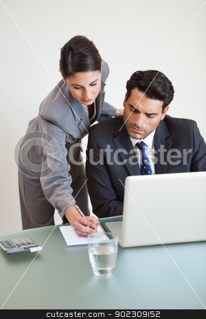 To use this stock image in your creative project, please select the size you need over to the right and click the "Add to Cart" button.
Your downloaded image will come with the Cutcaster watermark removed so don’t worry about the watermark you see on this page. Portrait of a good looking business team working with a laptop stock photo, Portrait of a good looking business team working with a laptop in an office by Wavebreak Media
