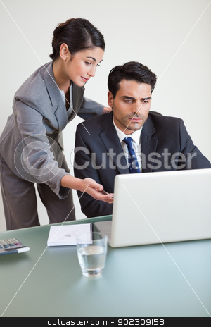 To use this stock image in your creative project, please select the size you need over to the right and click the "Add to Cart" button.
Your downloaded image will come with the Cutcaster watermark removed so don’t worry about the watermark you see on this page. Portrait of a good looking business team working with a notebook stock photo, Portrait of a good looking business team working with a notebook in an office by Wavebreak Media
