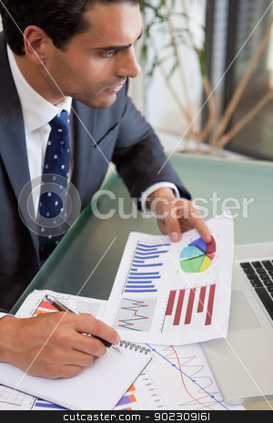 To use this stock image in your creative project, please select the size you need over to the right and click the "Add to Cart" button.
Your downloaded image will come with the Cutcaster watermark removed so don’t worry about the watermark you see on this page. Portrait of a sales person studying statistics stock photo, Portrait of a sales person studying statistics in an office by Wavebreak Media