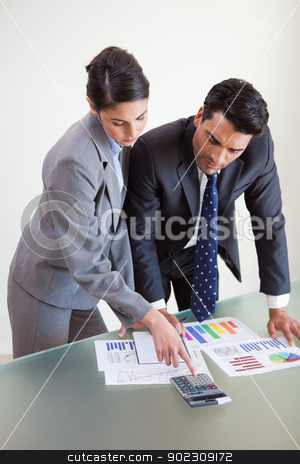 To use this stock image in your creative project, please select the size you need over to the right and click the "Add to Cart" button.
Your downloaded image will come with the Cutcaster watermark removed so don’t worry about the watermark you see on this page. Portrait of focused sales persons studying their results stock photo, Portrait of focused sales persons studying their results in an office by Wavebreak Media