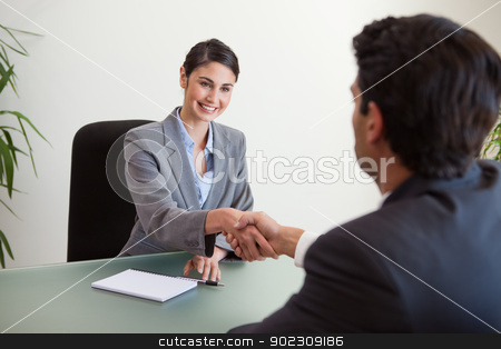 To use this stock image in your creative project, please select the size you need over to the right and click the "Add to Cart" button.
Your downloaded image will come with the Cutcaster watermark removed so don’t worry about the watermark you see on this page. Manager shaking the hand of a customer stock photo, Manager shaking the hand of a customer in her office by Wavebreak Media