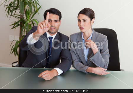 To use this stock image in your creative project, please select the size you need over to the right and click the "Add to Cart" button.
Your downloaded image will come with the Cutcaster watermark removed so don’t worry about the watermark you see on this page. Young business people negotiating stock photo, Young business people negotiating in a meeting room by Wavebreak Media