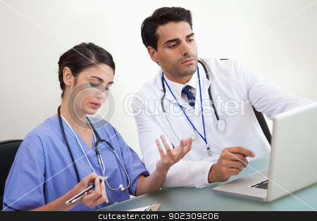 To use this stock image in your creative project, please select the size you need over to the right and click the "Add to Cart" button.
Your downloaded image will come with the Cutcaster watermark removed so don’t worry about the watermark you see on this page. Doctors working with a laptop stock photo, Doctors working with a laptop in an office by Wavebreak Media