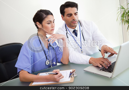 To use this stock image in your creative project, please select the size you need over to the right and click the "Add to Cart" button.
Your downloaded image will come with the Cutcaster watermark removed so don’t worry about the watermark you see on this page. Young doctors working with a notebook stock photo, Young doctors working with a notebook in an office by Wavebreak Media