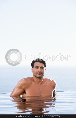 To use this stock image in your creative project, please select the size you need over to the right and click the "Add to Cart" button.
Your downloaded image will come with the Cutcaster watermark removed so don’t worry about the watermark you see on this page. Portrait of a man relaxing stock photo, Portrait of a man relaxing in a swimming pool by Wavebreak Media