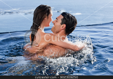To use this stock image in your creative project, please select the size you need over to the right and click the "Add to Cart" button.
Your downloaded image will come with the Cutcaster watermark removed so don’t worry about the watermark you see on this page. Joyful couple cuddling each other stock photo, Joyful couple cuddling each other in a swimming pool by Wavebreak Media