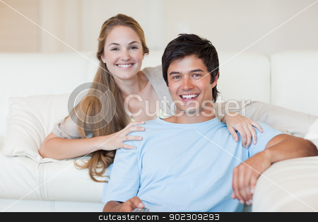 To use this stock image in your creative project, please select the size you need over to the right and click the "Add to Cart" button.
Your downloaded image will come with the Cutcaster watermark removed so don’t worry about the watermark you see on this page. Smiling couple watching television stock photo, Smiling couple watching television in their living room by Wavebreak Media