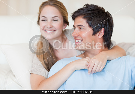 To use this stock image in your creative project, please select the size you need over to the right and click the "Add to Cart" button.
Your downloaded image will come with the Cutcaster watermark removed so don’t worry about the watermark you see on this page. Close up of a young couple posing stock photo, Close up of a young couple posing in their living room by Wavebreak Media