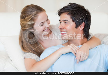 To use this stock image in your creative project, please select the size you need over to the right and click the "Add to Cart" button.
Your downloaded image will come with the Cutcaster watermark removed so don’t worry about the watermark you see on this page. Close up of a charming couple posing stock photo, Close up of a charming couple posing in their living room by Wavebreak Media