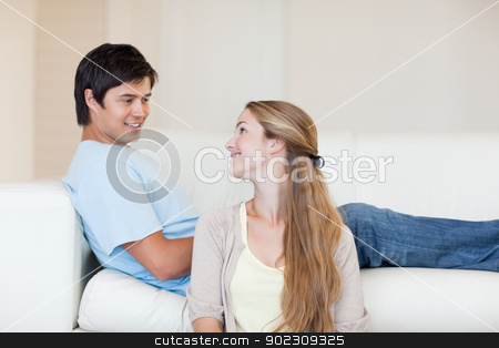 To use this stock image in your creative project, please select the size you need over to the right and click the "Add to Cart" button.
Your downloaded image will come with the Cutcaster watermark removed so don’t worry about the watermark you see on this page. Couple looking at each other stock photo, Couple looking at each other in their living room by Wavebreak Media