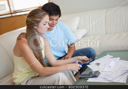 To use this stock image in your creative project, please select the size you need over to the right and click the "Add to Cart" button.
Your downloaded image will come with the Cutcaster watermark removed so don’t worry about the watermark you see on this page. Young couple cutting their credit card stock photo, Young couple cutting their credit card in their living room by Wavebreak Media