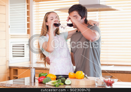 To use this stock image in your creative project, please select the size you need over to the right and click the "Add to Cart" button.
Your downloaded image will come with the Cutcaster watermark removed so don’t worry about the watermark you see on this page. Lovely couple drinking red wine stock photo, Lovely couple drinking red wine in their kitchen by Wavebreak Media