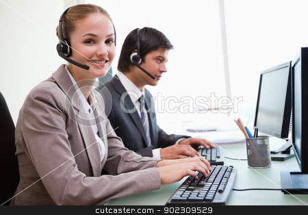 To use this stock image in your creative project, please select the size you need over to the right and click the "Add to Cart" button.
Your downloaded image will come with the Cutcaster watermark removed so don’t worry about the watermark you see on this page. Smiling office workers using computers stock photo, Smiling office workers using computers in an office by Wavebreak Media