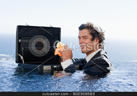 To use this stock image in your creative project, please select the size you need over to the right and click the "Add to Cart" button.
Your downloaded image will come with the Cutcaster watermark removed so don’t worry about the watermark you see on this page. Businessman drinking a cocktail stock photo, Businessman drinking a cocktail in a swimming pool by Wavebreak Media