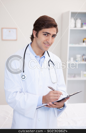 To use this stock image in your creative project, please select the size you need over to the right and click the "Add to Cart" button.
Your downloaded image will come with the Cutcaster watermark removed so don’t worry about the watermark you see on this page. Smiling male doctor taking notes stock photo, Smiling young male doctor taking notes by Wavebreak Media