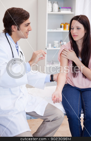 To use this stock image in your creative project, please select the size you need over to the right and click the "Add to Cart" button.
Your downloaded image will come with the Cutcaster watermark removed so don’t worry about the watermark you see on this page. Male doctor about to give an injection to patient stock photo, Male doctor about to give an injection to female patient by Wavebreak Media
