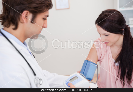 To use this stock image in your creative project, please select the size you need over to the right and click the "Add to Cart" button.
Your downloaded image will come with the Cutcaster watermark removed so don’t worry about the watermark you see on this page. Male doctor taking female patients blood pressure stock photo, Young male doctor taking female patients blood pressure by Wavebreak Media