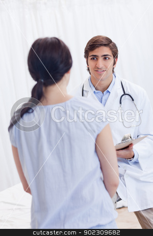To use this stock image in your creative project, please select the size you need over to the right and click the "Add to Cart" button.
Your downloaded image will come with the Cutcaster watermark removed so don’t worry about the watermark you see on this page. Young physician talking with patient stock photo, Young male physician talking with patient by Wavebreak Media