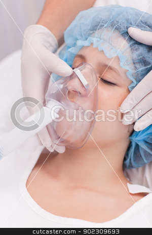 To use this stock image in your creative project, please select the size you need over to the right and click the "Add to Cart" button.
Your downloaded image will come with the Cutcaster watermark removed so don’t worry about the watermark you see on this page. Female patient with oxygen mask stock photo, Young female patient with oxygen mask by Wavebreak Media