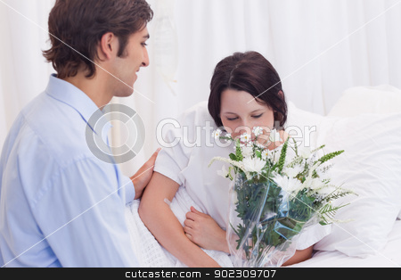 To use this stock image in your creative project, please select the size you need over to the right and click the "Add to Cart" button.
Your downloaded image will come with the Cutcaster watermark removed so don’t worry about the watermark you see on this page. Man brought flowers to his girlfriend in the hospital stock photo, Young man brought flowers to his girlfriend in the hospital by Wavebreak Media