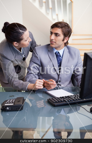 To use this stock image in your creative project, please select the size you need over to the right and click the "Add to Cart" button.
Your downloaded image will come with the Cutcaster watermark removed so don’t worry about the watermark you see on this page. Businesswoman explaining something to her colleague stock photo, Young businesswoman explaining something to her colleague by Wavebreak Media