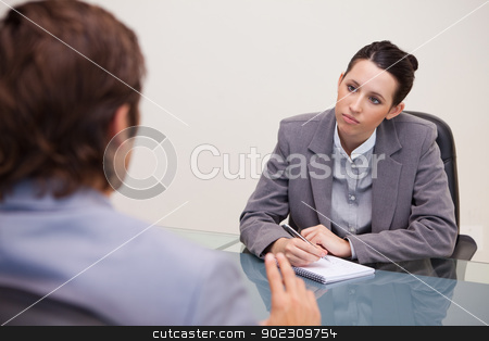 To use this stock image in your creative project, please select the size you need over to the right and click the "Add to Cart" button.
Your downloaded image will come with the Cutcaster watermark removed so don’t worry about the watermark you see on this page. Businesswoman taking notes in a meeting stock photo, Young businesswoman taking notes in a meeting by Wavebreak Media