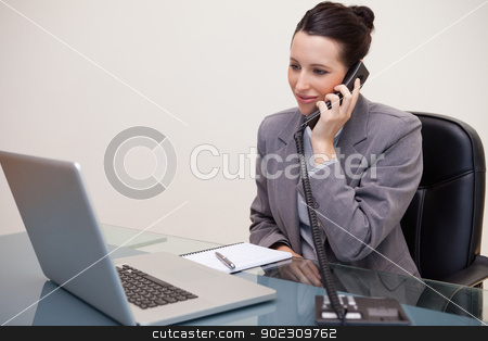 To use this stock image in your creative project, please select the size you need over to the right and click the "Add to Cart" button.
Your downloaded image will come with the Cutcaster watermark removed so don’t worry about the watermark you see on this page. Smiling businesswoman on the telephone stock photo, Smiling young businesswoman on the telephone by Wavebreak Media