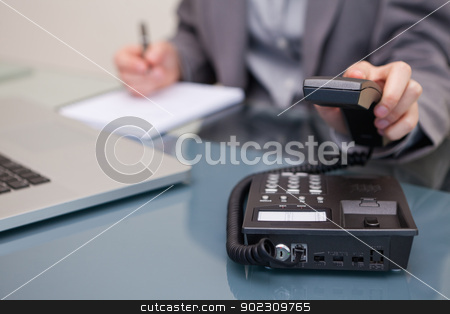To use this stock image in your creative project, please select the size you need over to the right and click the "Add to Cart" button.
Your downloaded image will come with the Cutcaster watermark removed so don’t worry about the watermark you see on this page. Telephone being hung up by businesswoman stock photo, Telephone being hung up by young businesswoman by Wavebreak Media