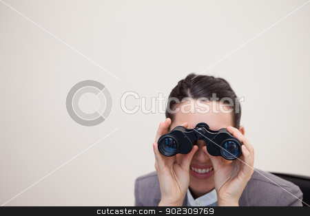 To use this stock image in your creative project, please select the size you need over to the right and click the "Add to Cart" button.
Your downloaded image will come with the Cutcaster watermark removed so don’t worry about the watermark you see on this page. Businesswoman looking through binoculars stock photo, Young businesswoman looking through binoculars by Wavebreak Media