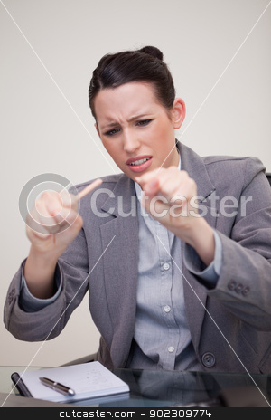 To use this stock image in your creative project, please select the size you need over to the right and click the "Add to Cart" button.
Your downloaded image will come with the Cutcaster watermark removed so don’t worry about the watermark you see on this page. Businesswoman just broke her pencil stock photo, Young businesswoman just broke her pencil by Wavebreak Media