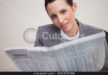 To use this stock image in your creative project, please select the size you need over to the right and click the "Add to Cart" button.
Your downloaded image will come with the Cutcaster watermark removed so don’t worry about the watermark you see on this page. Businesswoman with newspaper stock photo, Young businesswoman with newspaper by Wavebreak Media