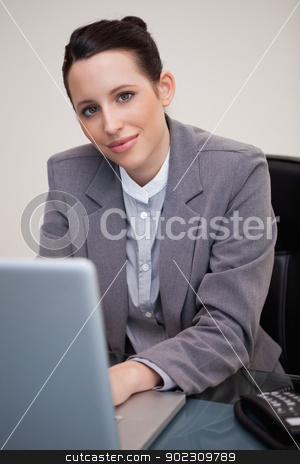 To use this stock image in your creative project, please select the size you need over to the right and click the "Add to Cart" button.
Your downloaded image will come with the Cutcaster watermark removed so don’t worry about the watermark you see on this page. Businesswoman working at her desk stock photo, Young businesswoman working at her desk by Wavebreak Media