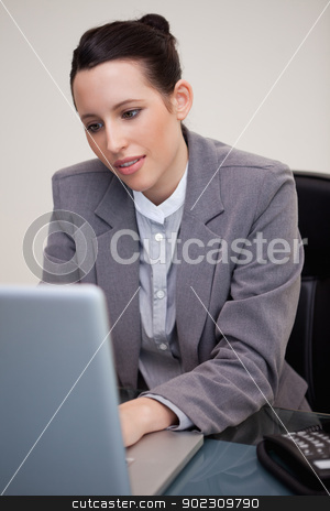 To use this stock image in your creative project, please select the size you need over to the right and click the "Add to Cart" button.
Your downloaded image will come with the Cutcaster watermark removed so don’t worry about the watermark you see on this page. Businesswoman working on her laptop stock photo, Young businesswoman working on her laptop by Wavebreak Media