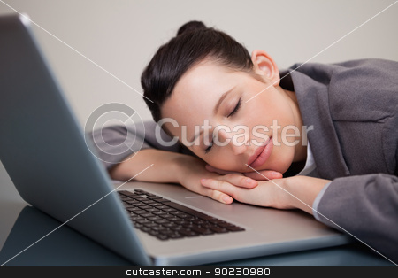 To use this stock image in your creative project, please select the size you need over to the right and click the "Add to Cart" button.
Your downloaded image will come with the Cutcaster watermark removed so don’t worry about the watermark you see on this page. Businesswoman taking a nap on her laptop stock photo, Young businesswoman taking a nap on her laptop by Wavebreak Media