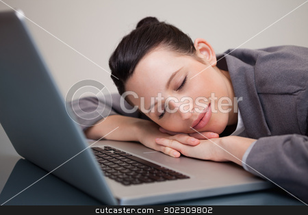 To use this stock image in your creative project, please select the size you need over to the right and click the "Add to Cart" button.
Your downloaded image will come with the Cutcaster watermark removed so don’t worry about the watermark you see on this page. Businesswoman taking a small nap on her laptop stock photo, Young businesswoman taking a small nap on her laptop by Wavebreak Media