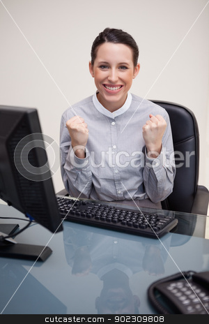 To use this stock image in your creative project, please select the size you need over to the right and click the "Add to Cart" button.
Your downloaded image will come with the Cutcaster watermark removed so don’t worry about the watermark you see on this page. Businesswoman behind her desk having a success stock photo, Young businesswoman behind her desk having a success by Wavebreak Media